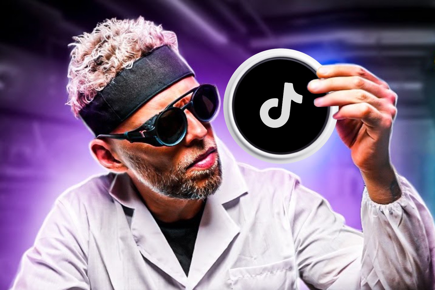 DJ facing a crowd at his deck. Photo with a purple hue